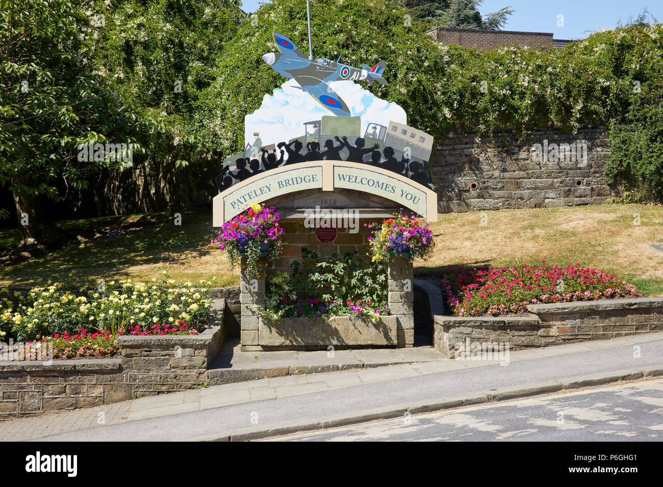 The floral decorated Fox's Head Well at Pateley Bridge advertising the forthcoming 1940's weekend. Stock Photo