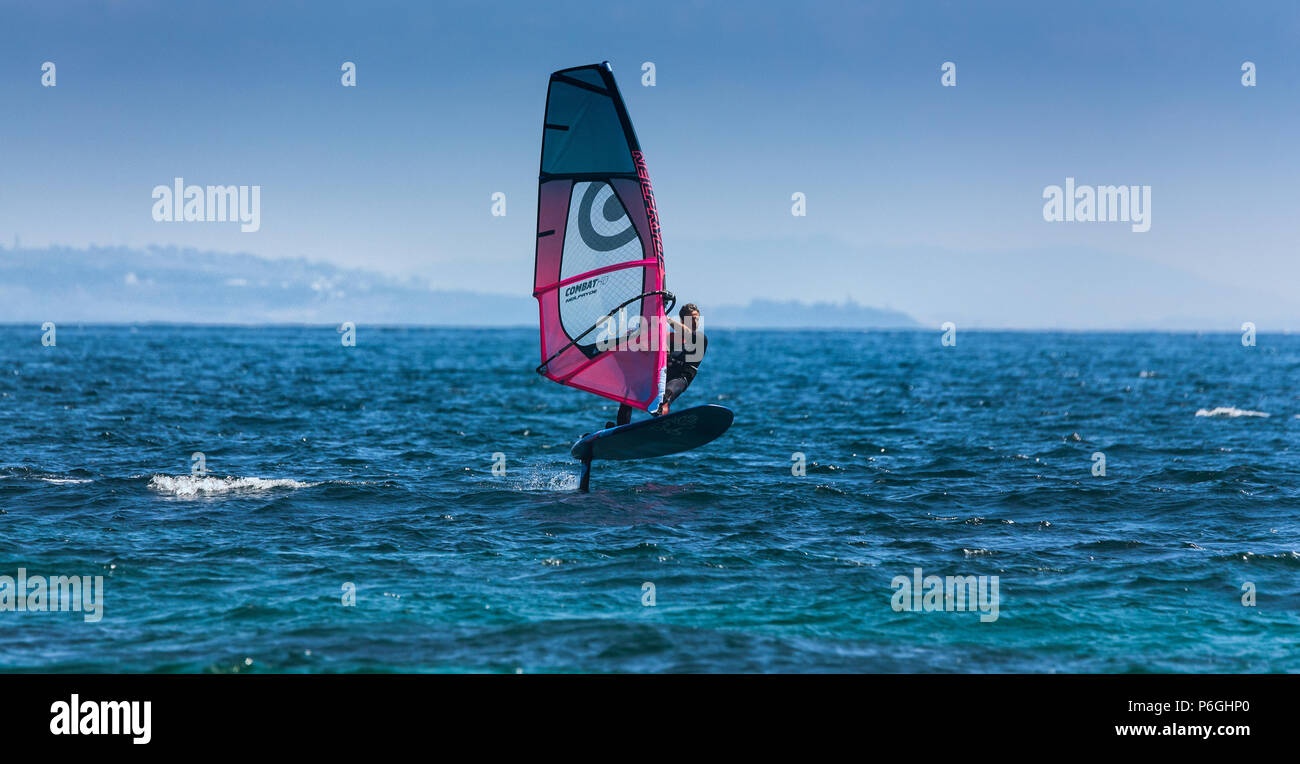 Foil windsurfing in Tarifa, Costa de la Luz, Cadiz, Andalusia, Spain. Stock Photo