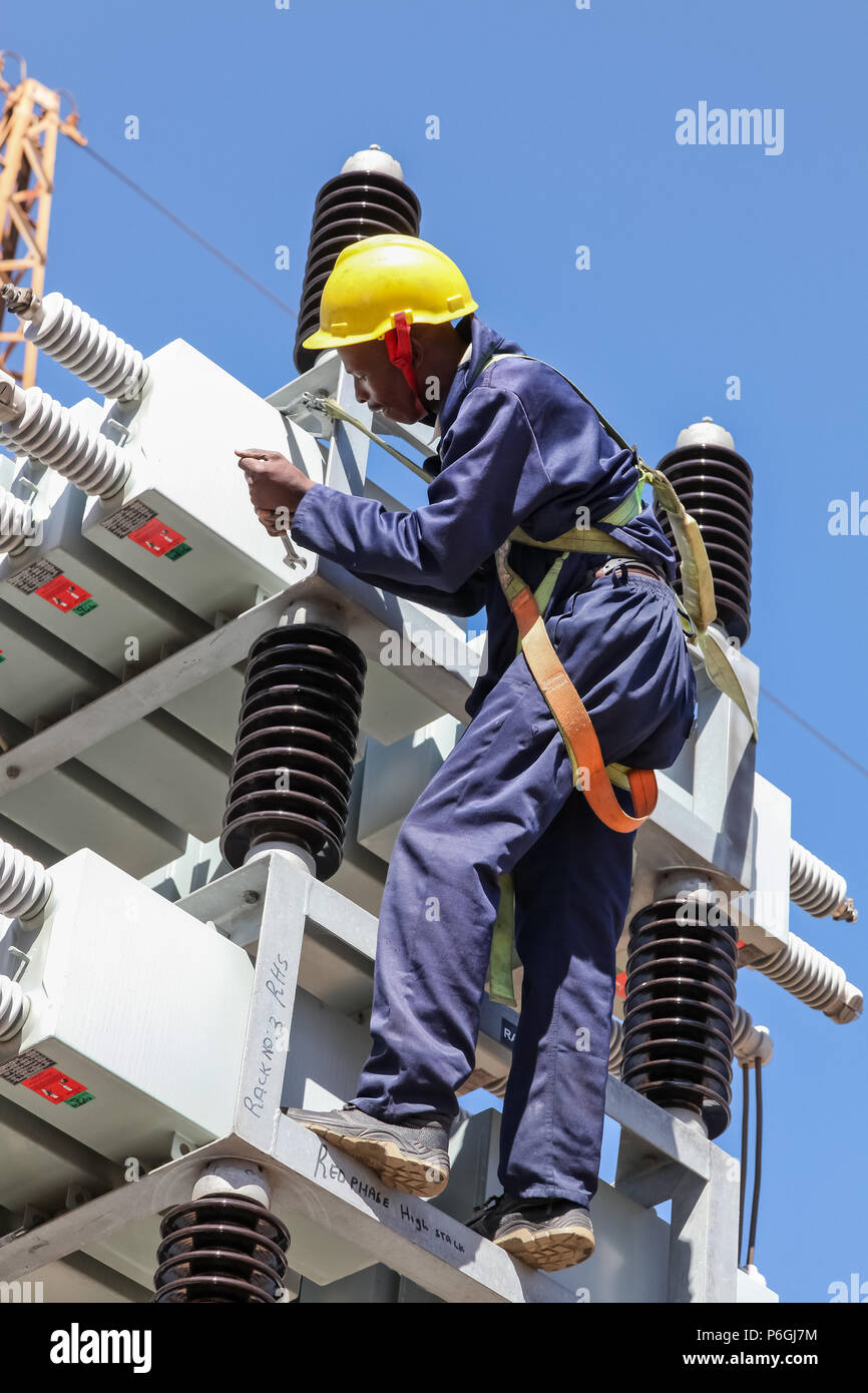 Johannesburg, South Africa, 04/11/2012, Electricians working on high