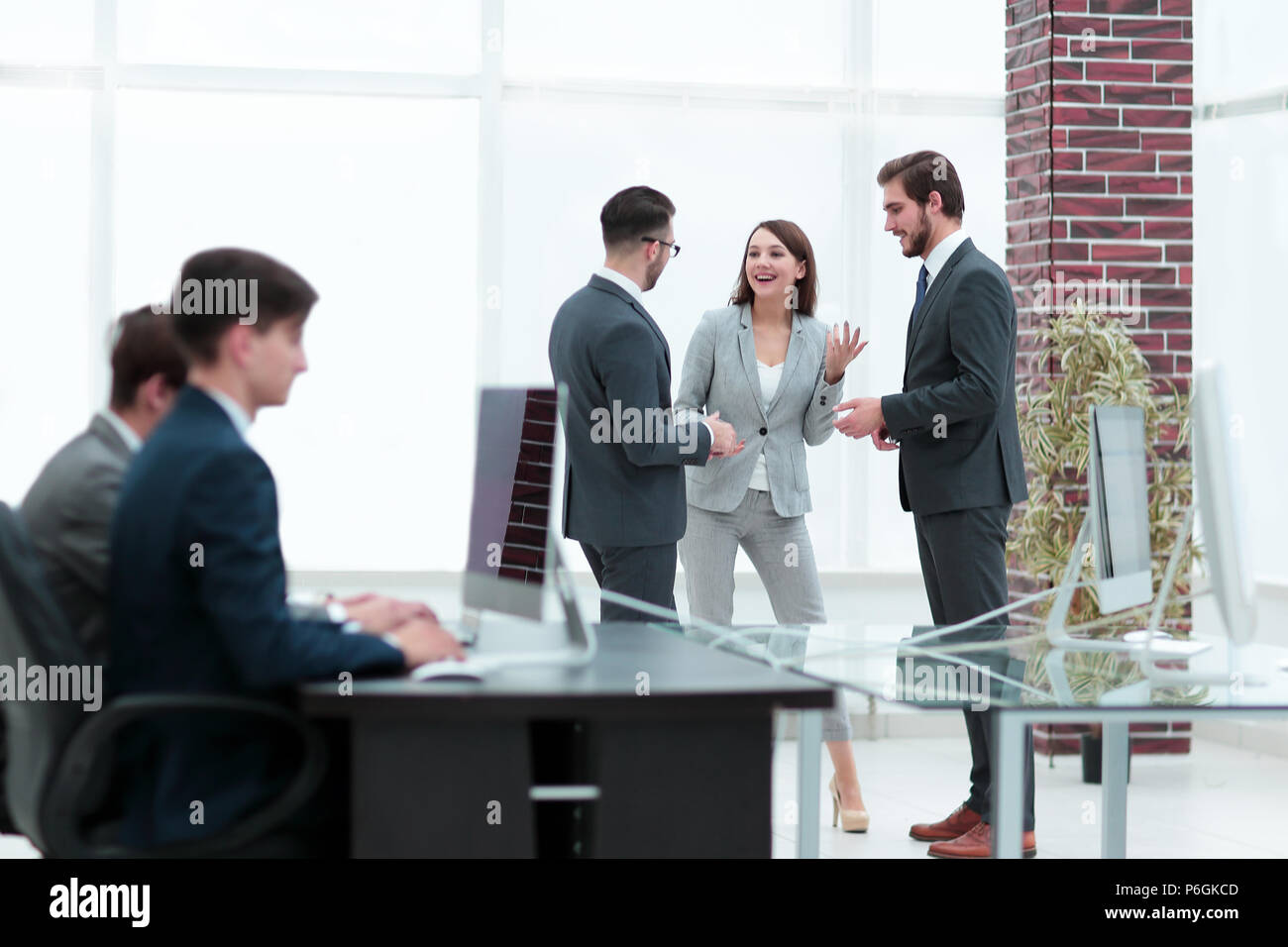 Young business crew working with startup modern office. Stock Photo