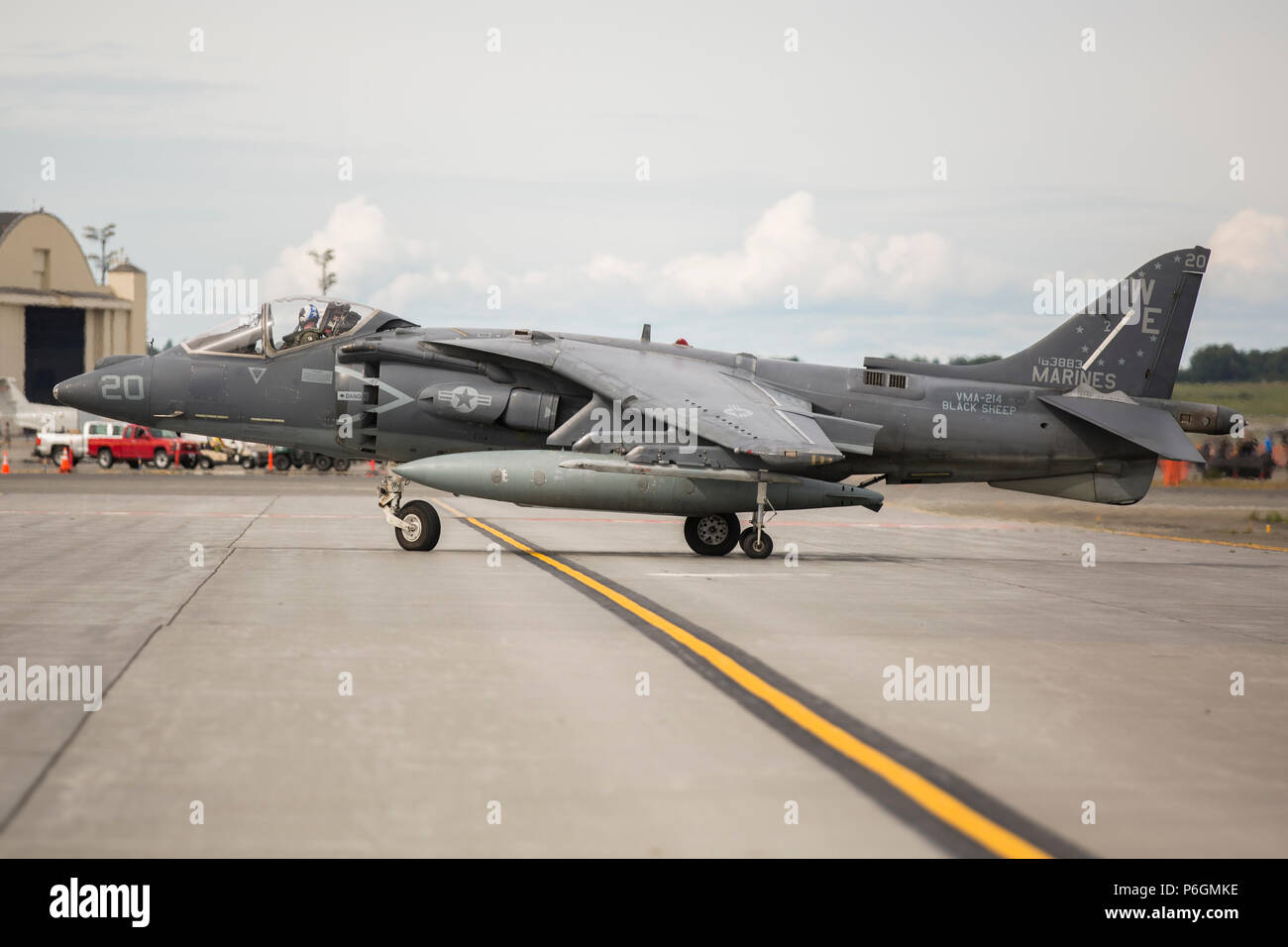 Marine Attack Squadron (VMA) 214 Marines participate in the 2018 Arctic Thunder Air Show at Joint Base Elmendorf-Richardson, Alaska, June 29, 2018. VMA-214 conducted a flyby and hover demonstration with the AV-8B Harrier during the air show. (U.S. Marine Corps photo by Lance Cpl. Sabrina Candiaflores) Stock Photo