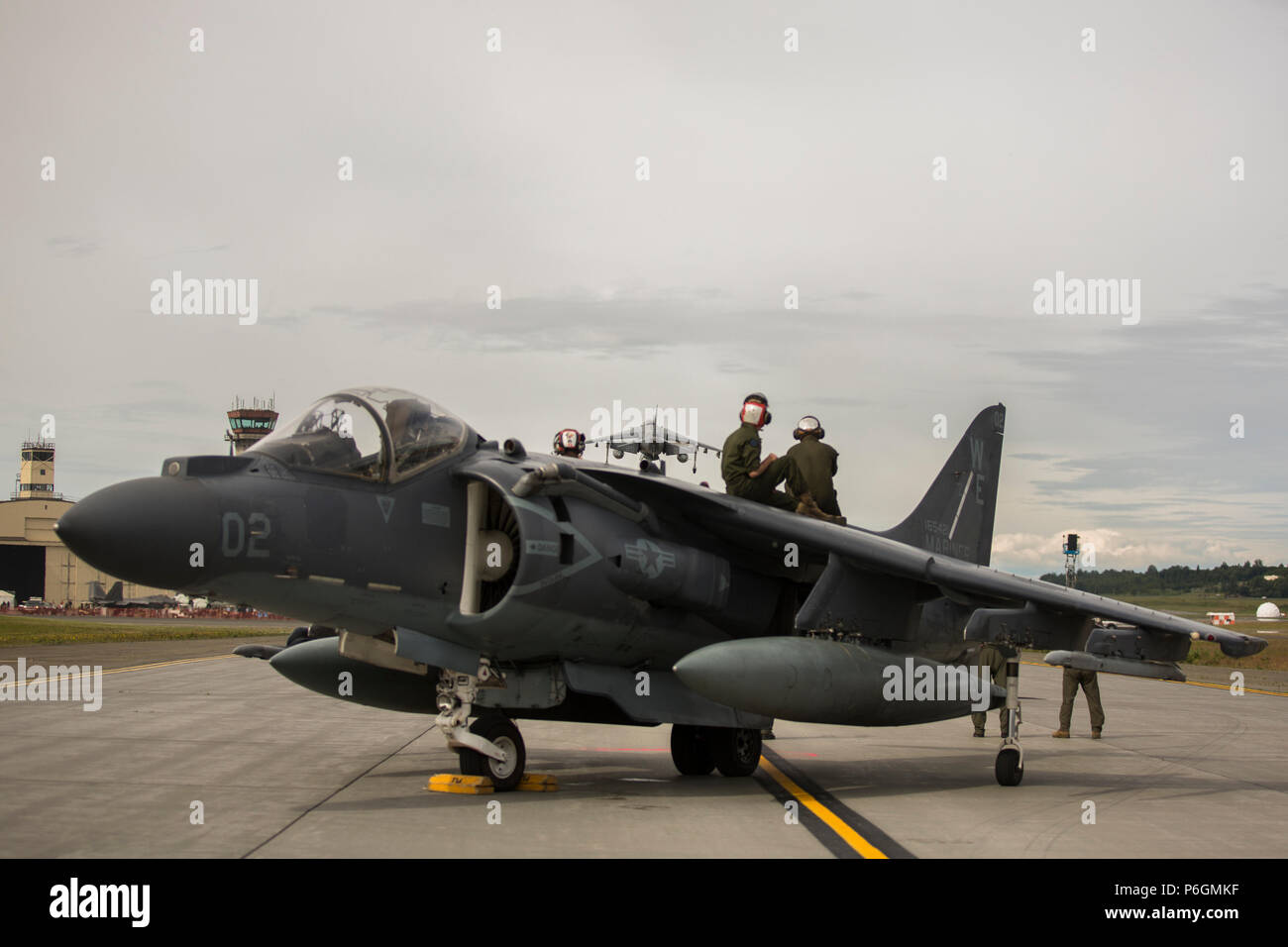 Marine Attack Squadron (VMA) 214 Marines participate in the 2018 Arctic Thunder Air Show at Joint Base Elmendorf-Richardson, Alaska, June 29, 2018. VMA-214 conducted a flyby and hover demonstration with the AV-8B Harrier during the air show. (U.S. Marine Corps photo by Lance Cpl. Sabrina Candiaflores) Stock Photo