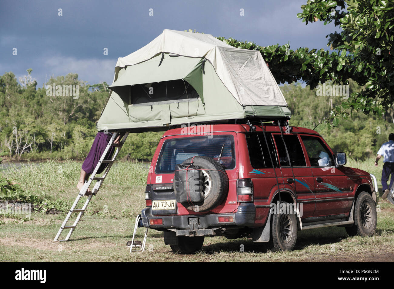 Camping in vehicle rooftop tent in Queensland, Australia Stock Photo