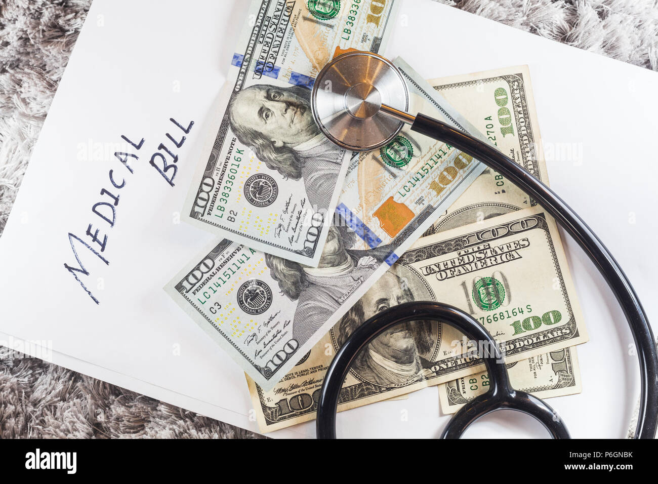 Stethoscope with wording of "Medical Bill" showing expensive healthcare