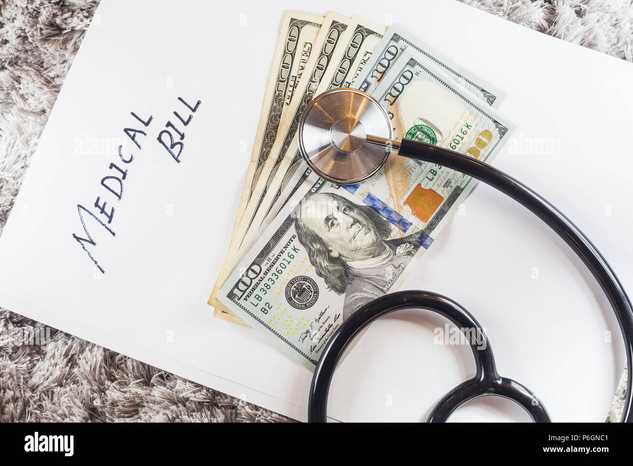 Stethoscope with wording of "Medical Bill" showing expensive healthcare