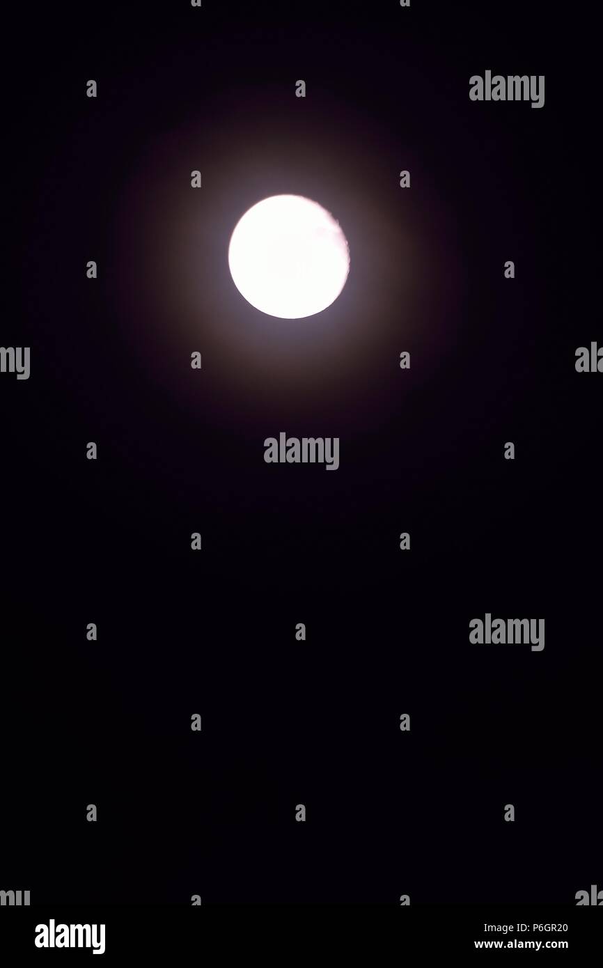 Nature background of shining full moon in dark night sky Stock Photo ...