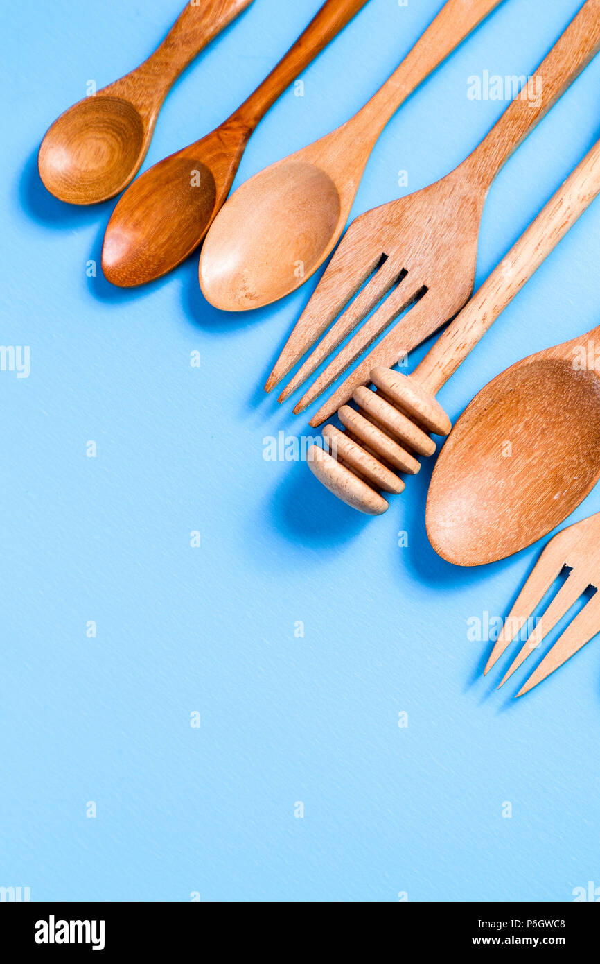 Wooden spoon on blue background, for background menu food Stock Photo ...