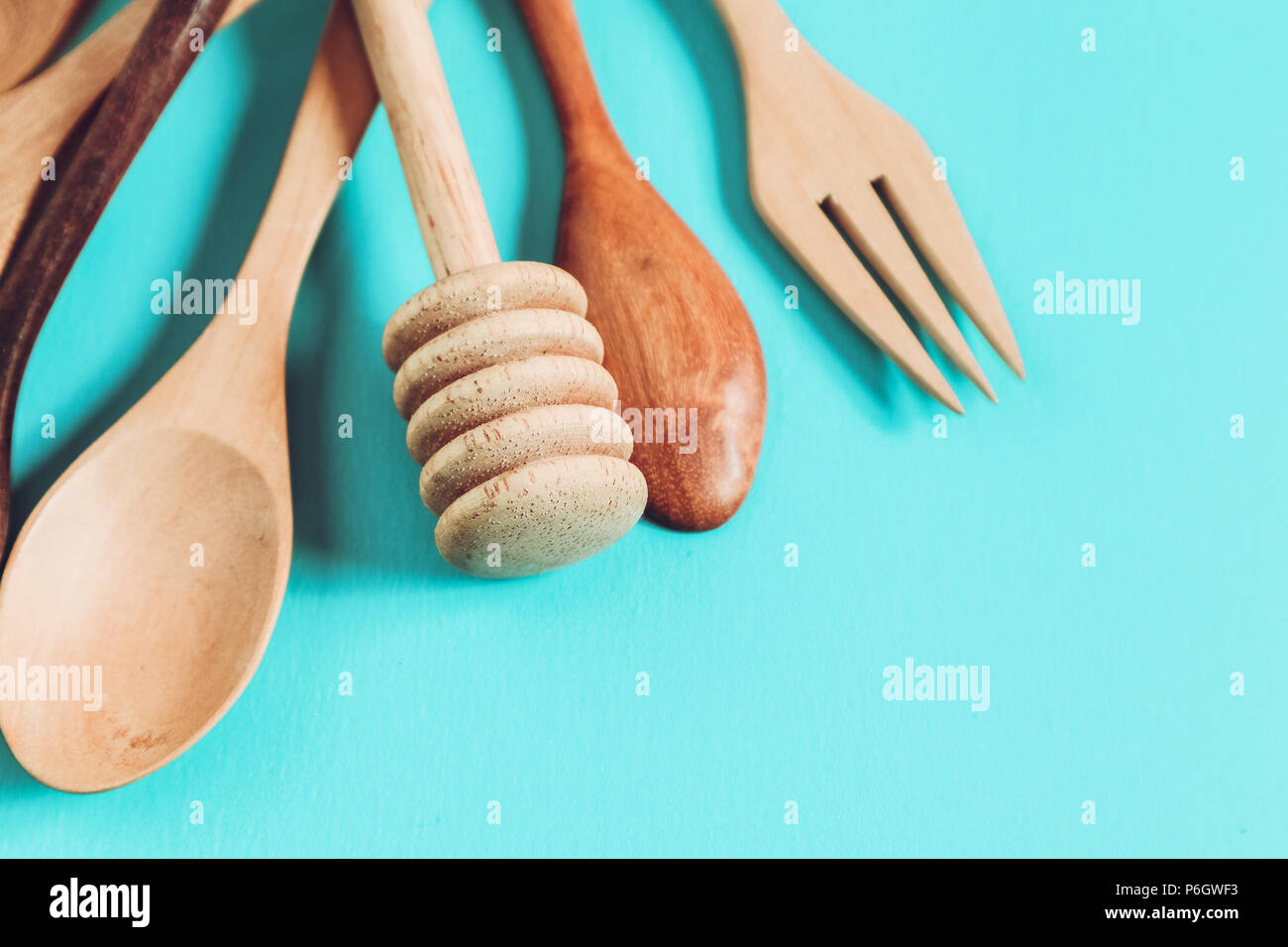 Wooden spoon on blue background, for background menu food Stock Photo ...