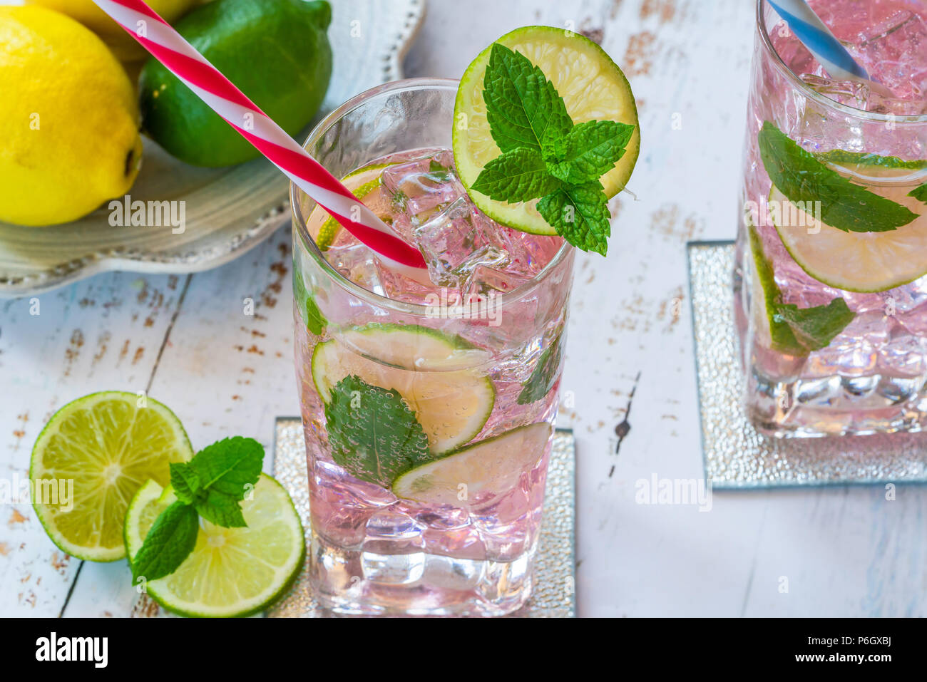 Pink rose lemonade with lime and fresh mint. Refreshing summer non