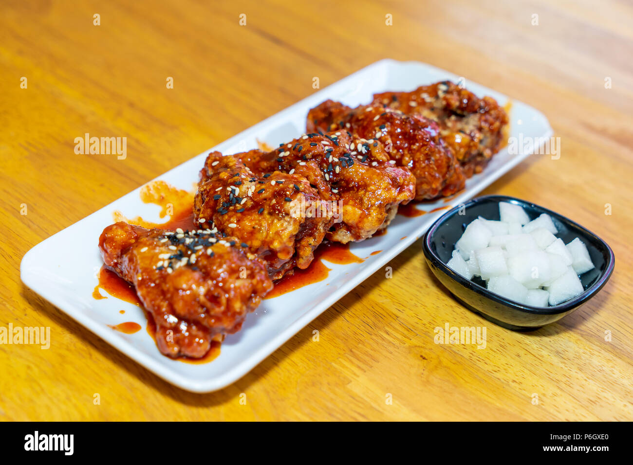 Spicy Korean sauce coated on fried chicken drumlets, Korean spicy