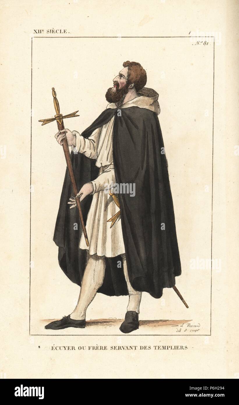 Knight Templar squire or servant brother, 12th century. He wears a black hooded cape over white tunic, and carries his knight's sword. Handcoloured copperplate drawn and engraved by Leopold Massard from 'French Costumes from King Clovis to Our Days,' Massard, Mifliez, Paris, 1834. Stock Photo