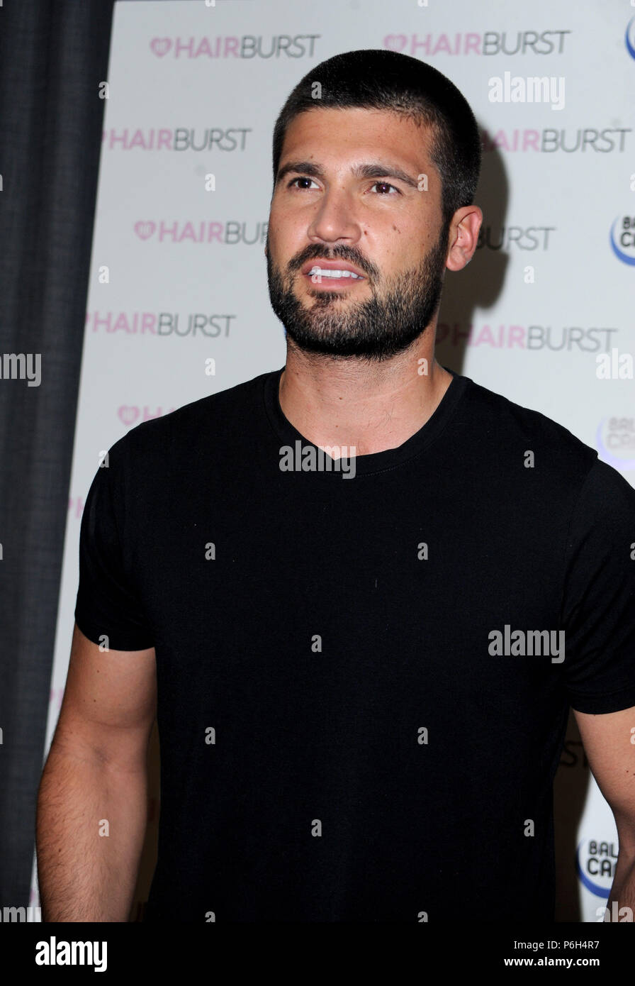 Dan Edgar takes part in a charity head shave, along with Love Island Alumni Nathan Massey. In partnership with Hairburst, Dan & Nathan hope to raise £50,000 for Balls to Cancer – the charity that aims to eradicate male cancers, whilst having fun. As part of the campaign, Hairburst have pledged £10,000 in addition to the £50,000 target  Featuring: Dan Edgar Where: London, United Kingdom When: 30 May 2018 Credit: WENN.com Stock Photo