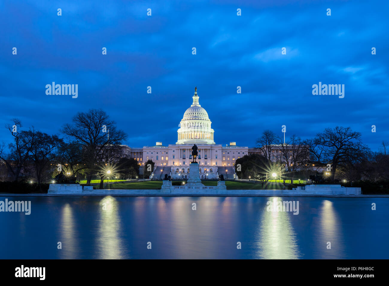 The United States Capitol with reflection at night, Washington DC, USA Stock Photo