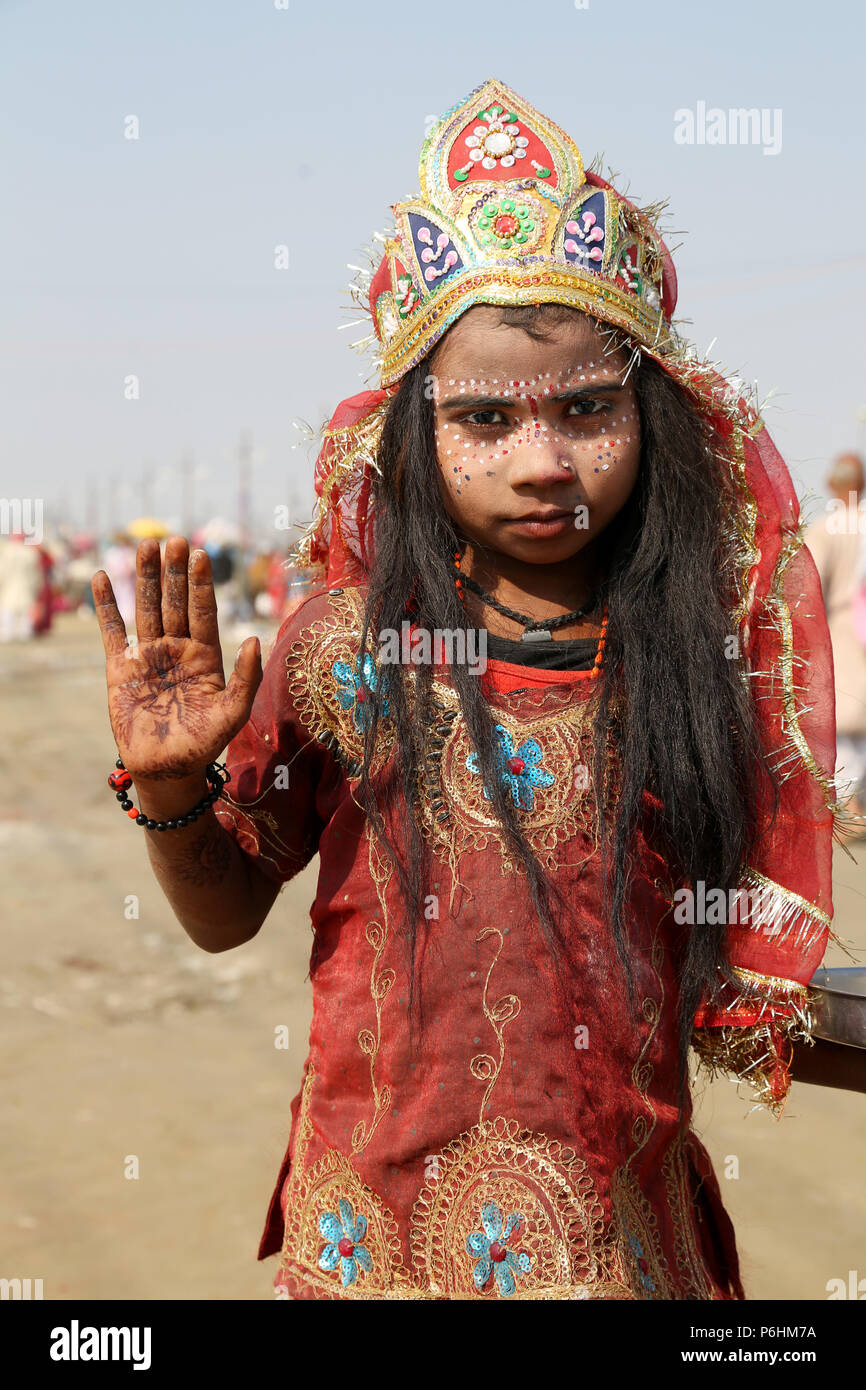 Portrait of child dressed as hindu god during Maha Kumbh mela 2013 in Allahabad , India Stock Photo