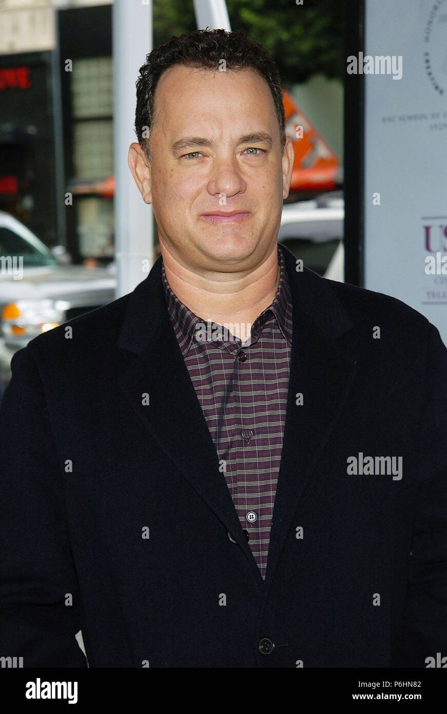 Tom Hanks arriving at the Polar Express Premiere at The Grauman Chinese Theatre in Los Angeles. 11/07/2004. 09-HanksTom090 Red Carpet Event, Vertical, USA, Film Industry, Celebrities,  Photography, Bestof, Arts Culture and Entertainment, Topix Celebrities fashion /  Vertical, Best of, Event in Hollywood Life - California,  Red Carpet and backstage, USA, Film Industry, Celebrities,  movie celebrities, TV celebrities, Music celebrities, Photography, Bestof, Arts Culture and Entertainment,  Topix, headshot, vertical, one person,, from the year , 2004, inquiry tsuni@Gamma-USA.com Stock Photo