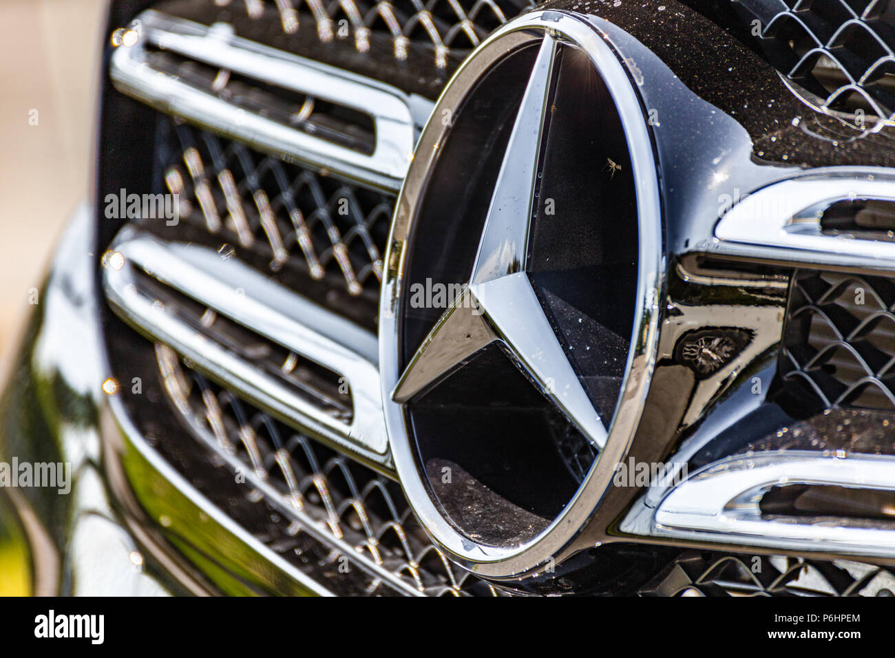RAVENNA, ITALY JUNE 30, 2018 Dirt and dust cover the MERCEDES logo