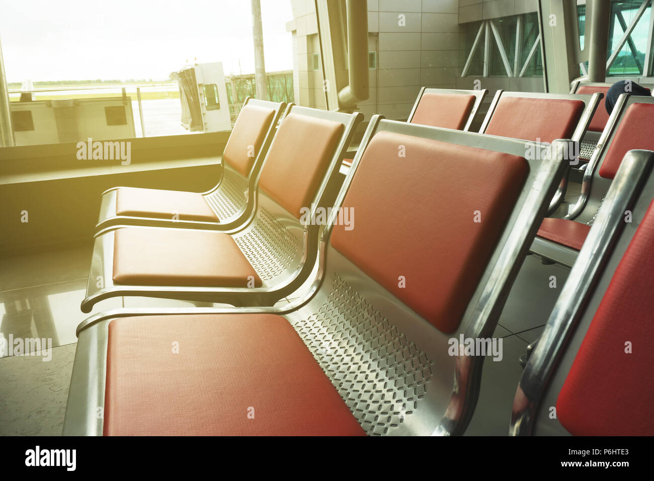 Empty seat at the airport departure hall Stock Photo