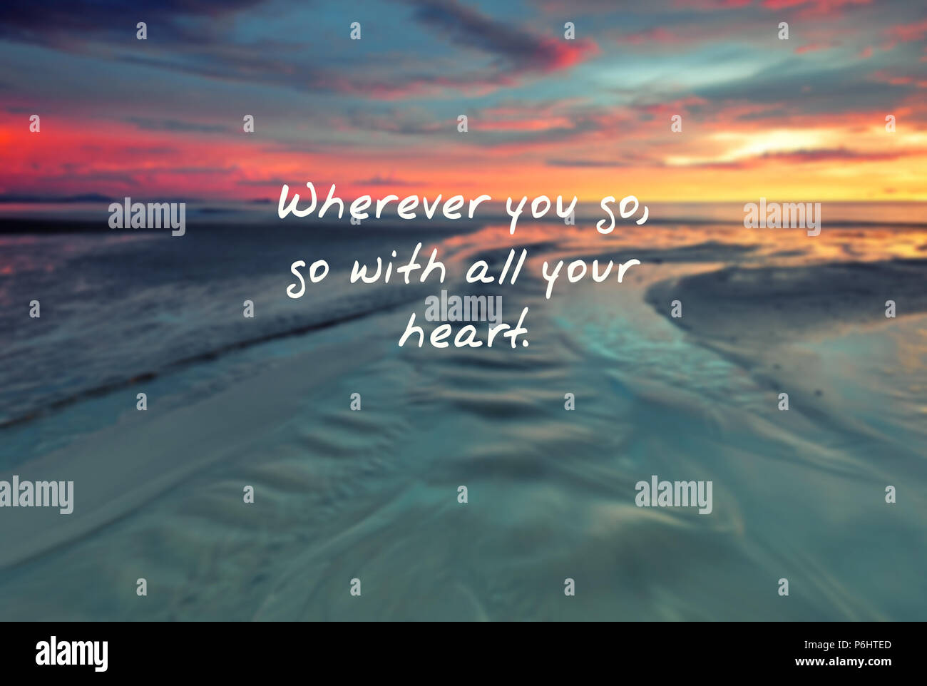 Travel motivational and inspiration quote- Whenever you go, go with all your heart. Retro style Stock Photo