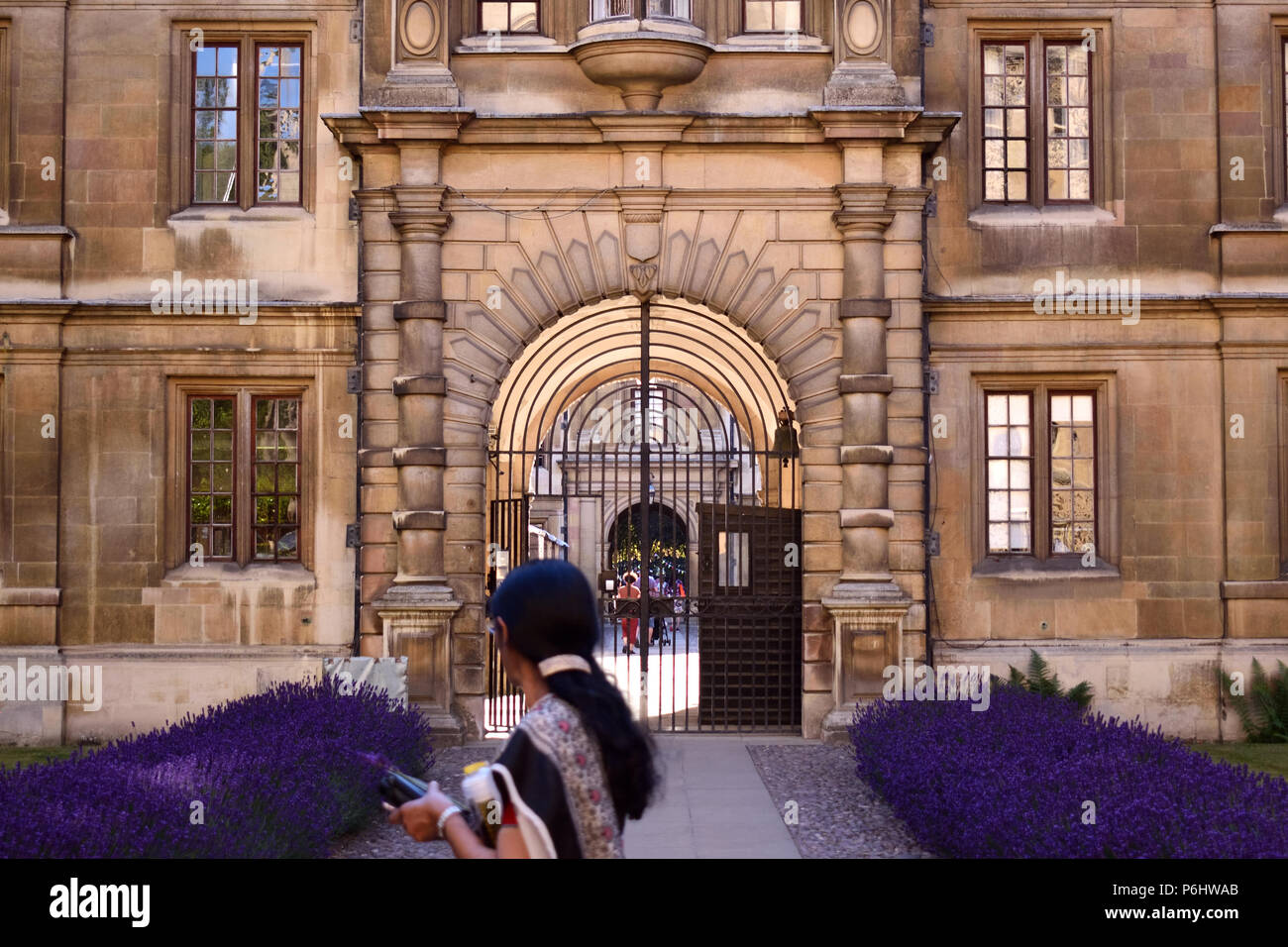 The gates of Clare College's Old Court on a summer's evening Stock Photo