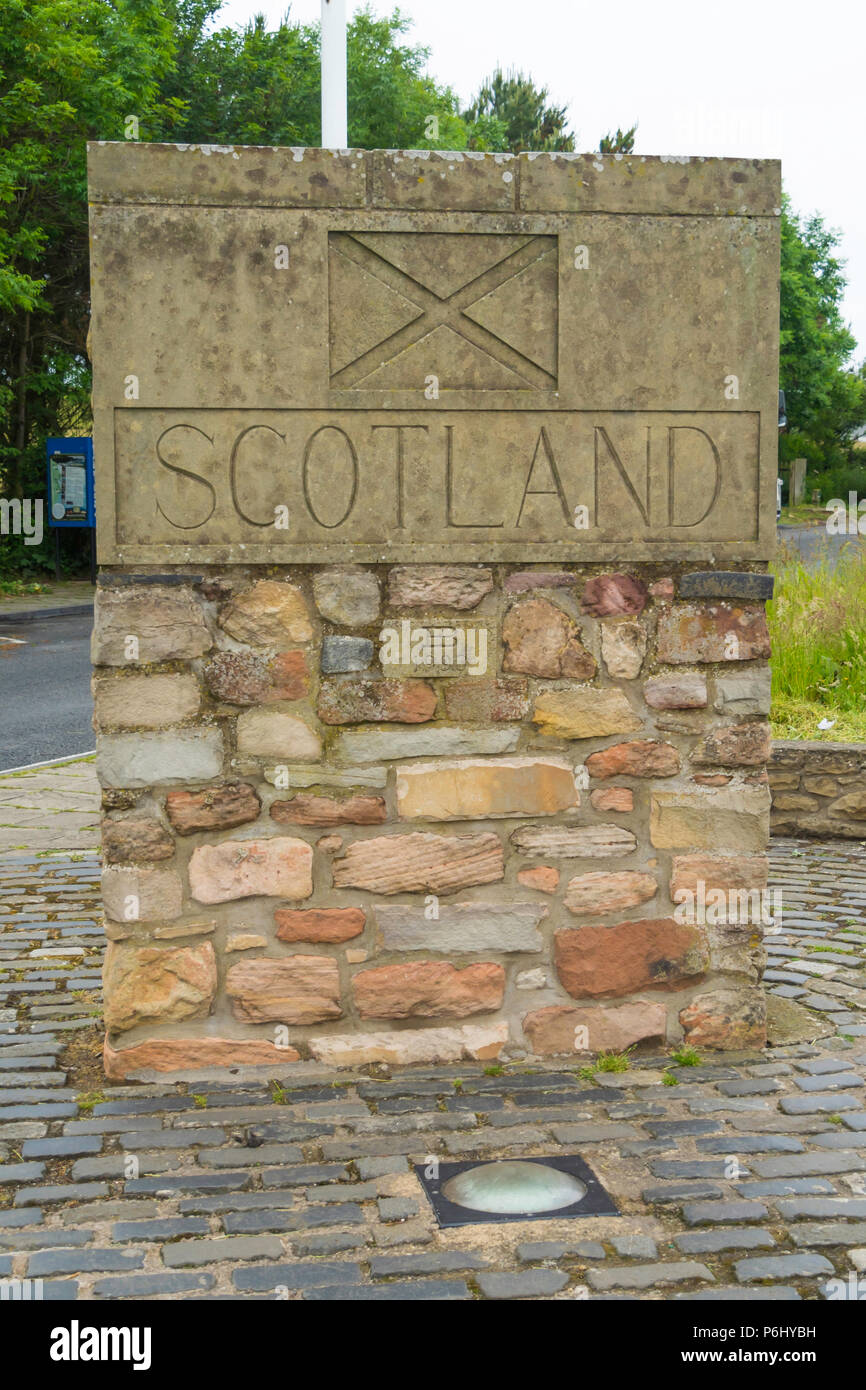 A stone built Scotland  road sign erected 1993 on the A1 road on the border between England and Scotland Stock Photo