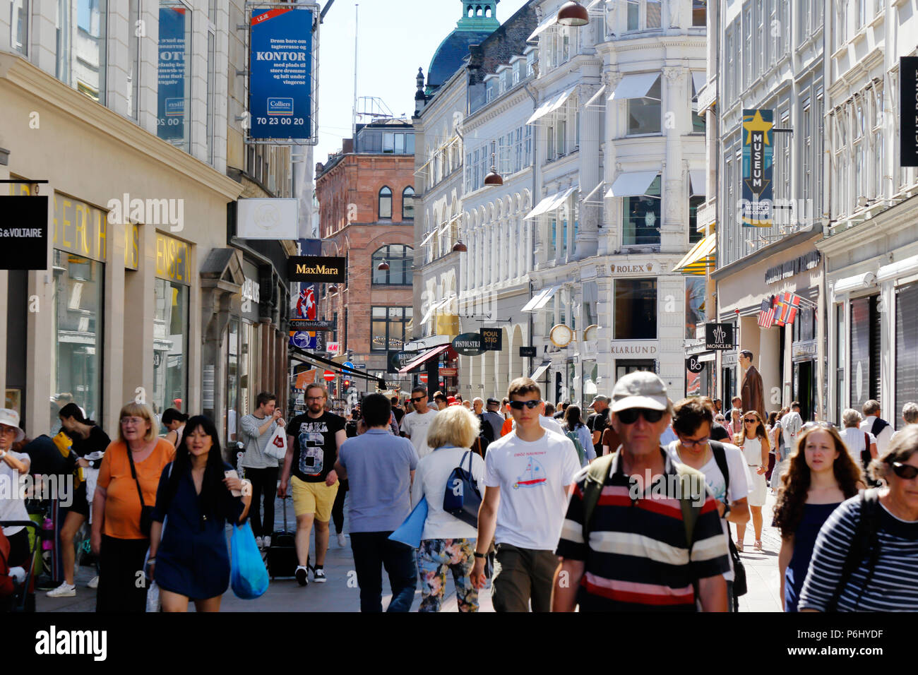 Copenhagen, Denmark - June 27, 2018: People walking the Stroget shopping street in downtown Copenhagen. Stock Photo