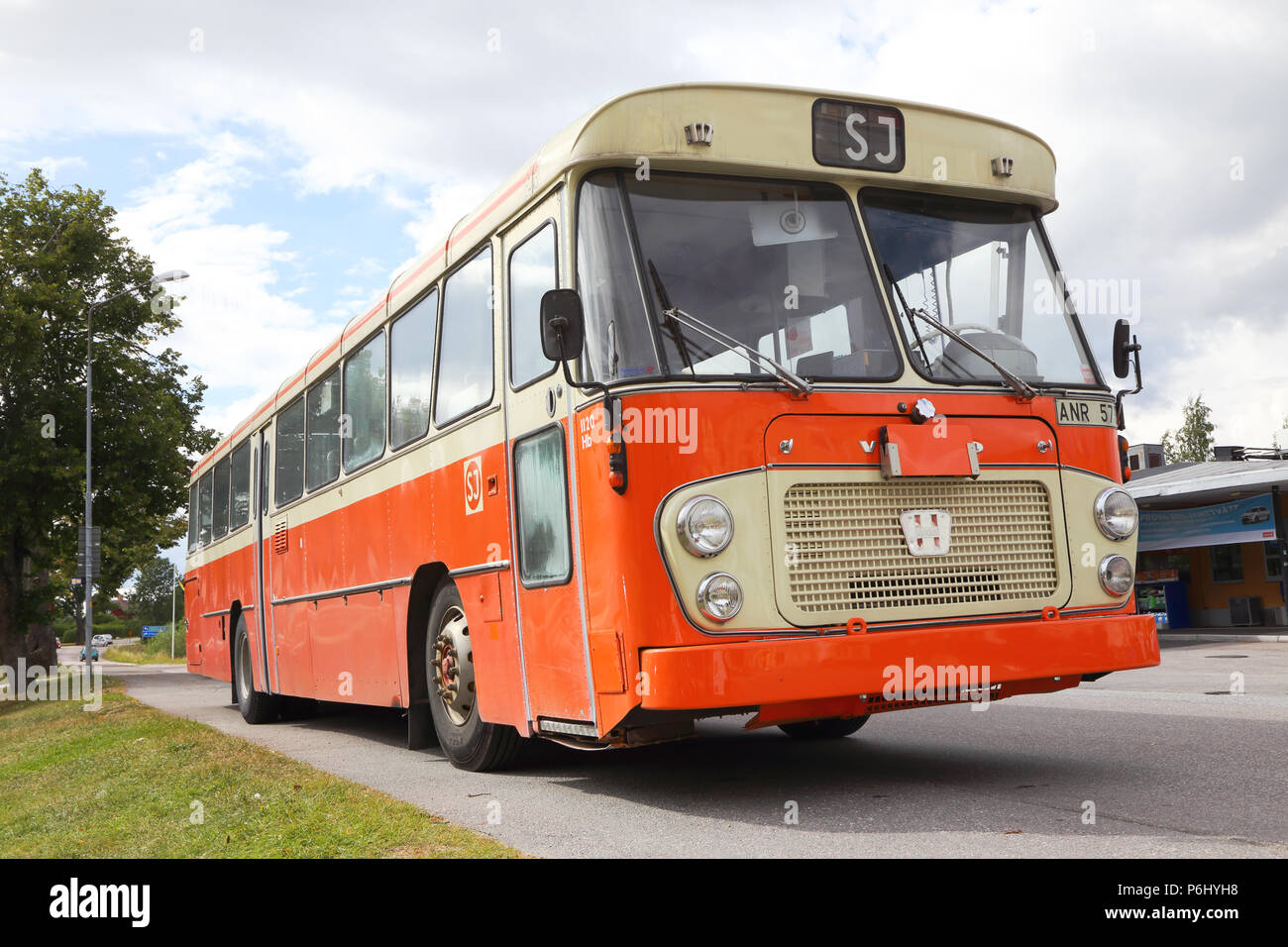 Mariefred, Sweden - August 7, 2016: Former SJ bus Volvo model B58 year 1970 with body made of Hagglund and sons painted in 1986 color scheme (orange a Stock Photo