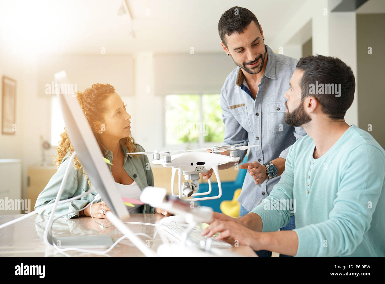 Startup people in office working on drone technology Stock Photo - Alamy