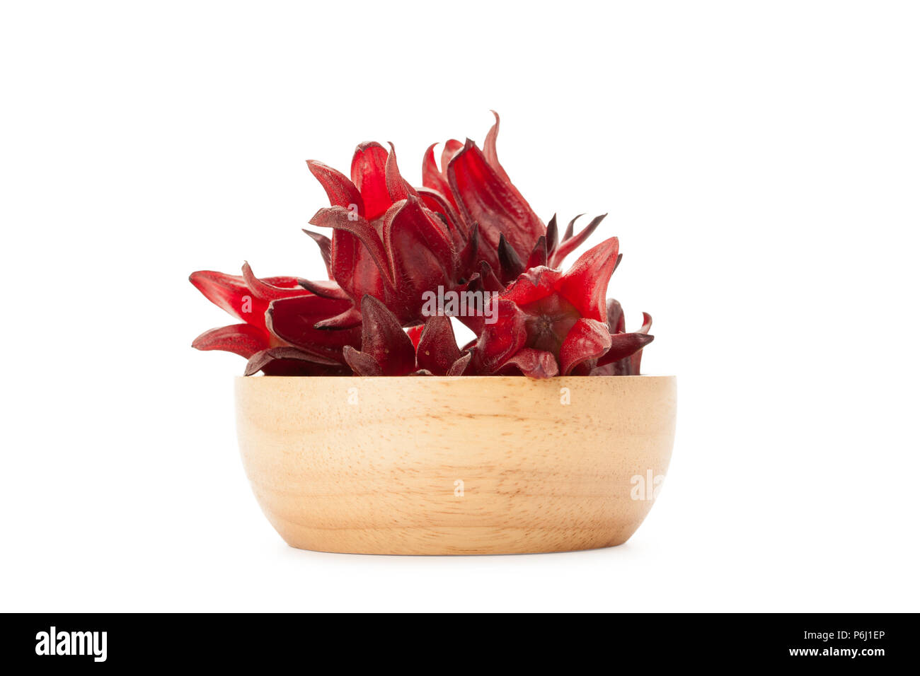 front view angle of red roselle wooden bowl isolated on white background with clupping path and soft shadow Stock Photo