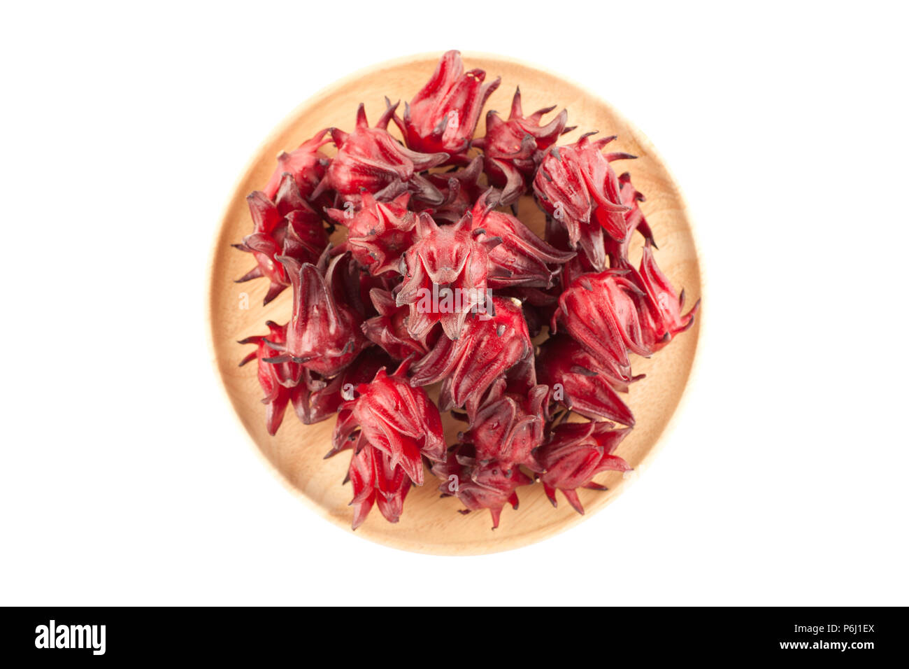 Top view angle of red roselle wooden bowl isolated on white background with clupping path Stock Photo