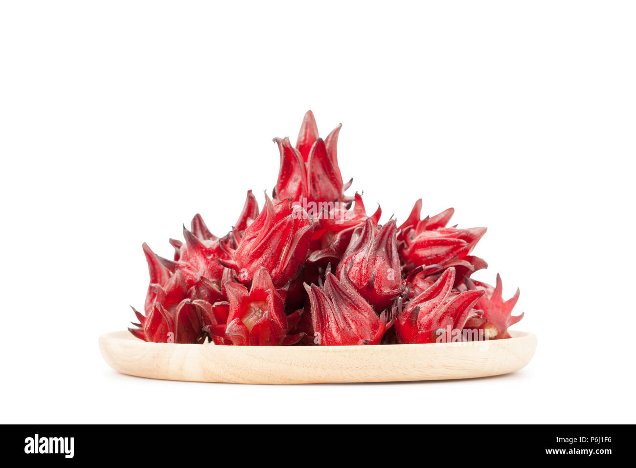 Front view angle of red roselle wooden plate isolated on white background with clupping path and soft shadow Stock Photo