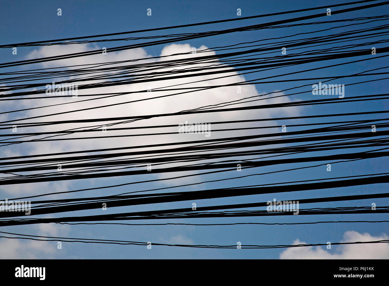 Thailands power and phone cables live in sight of the community