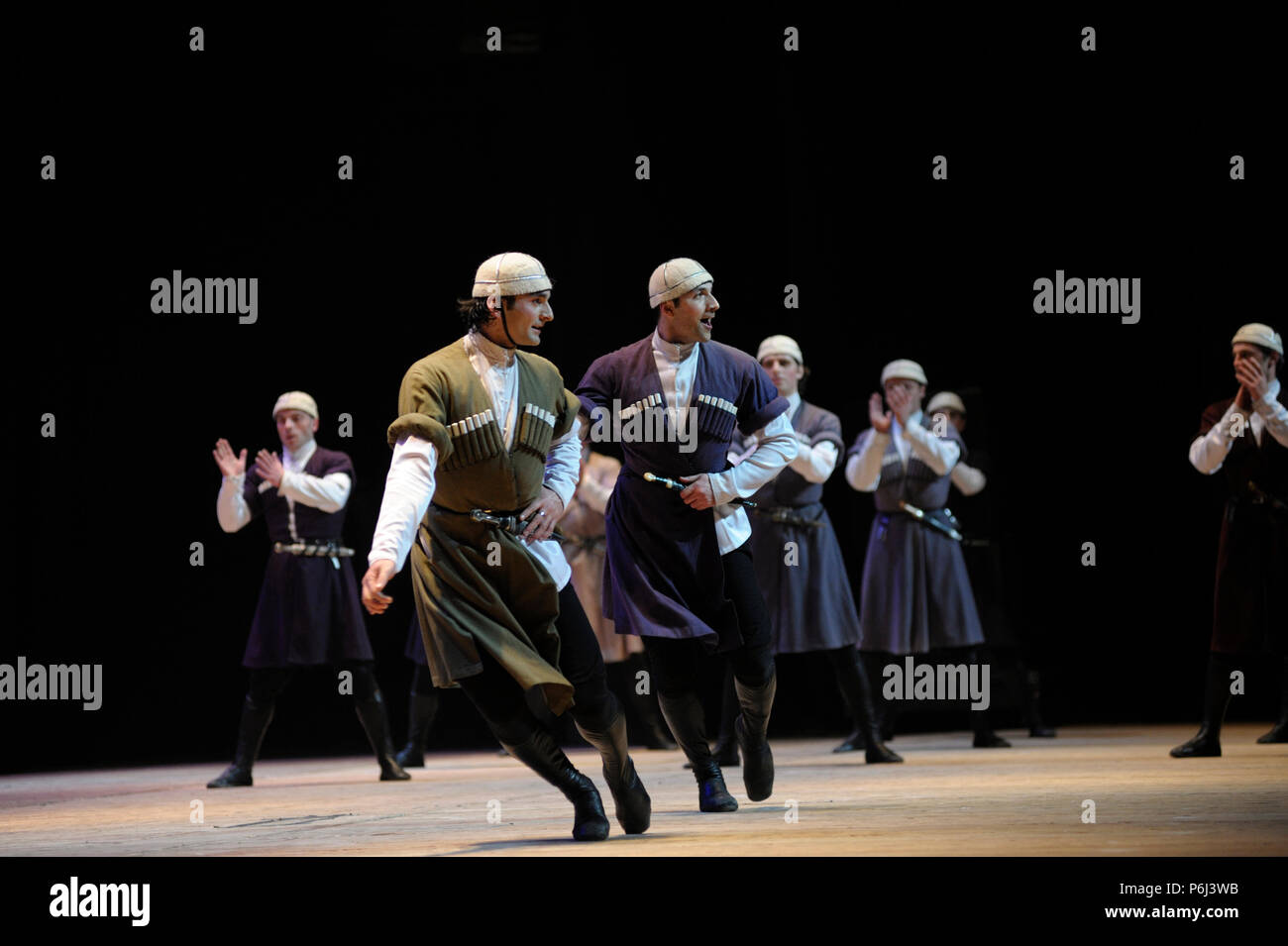 Dancers performing native Georgian dance with sabers. Sukhishvili, The ...