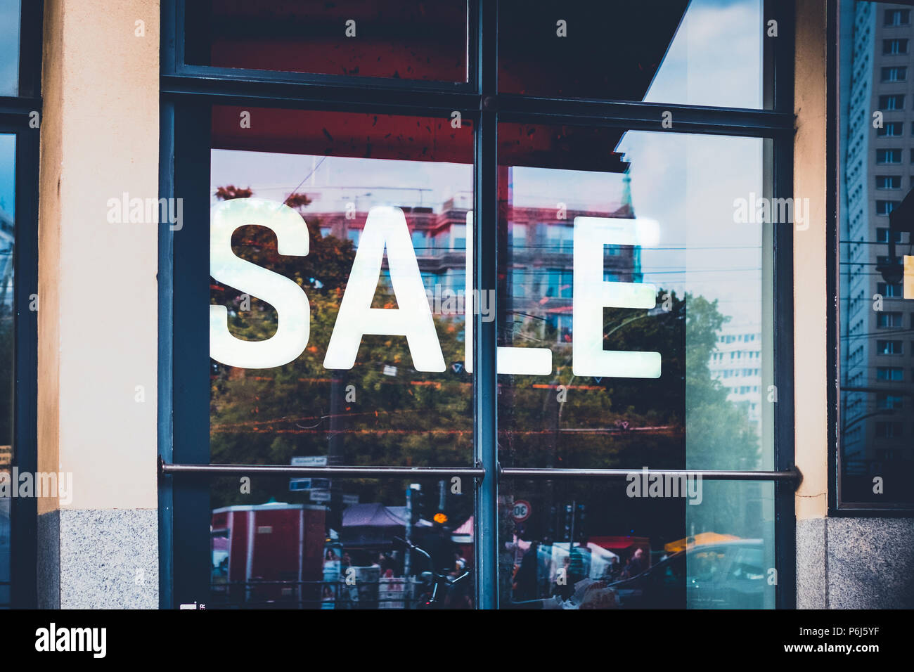 Sale shopping window, store display the word sale Stock Photo Alamy