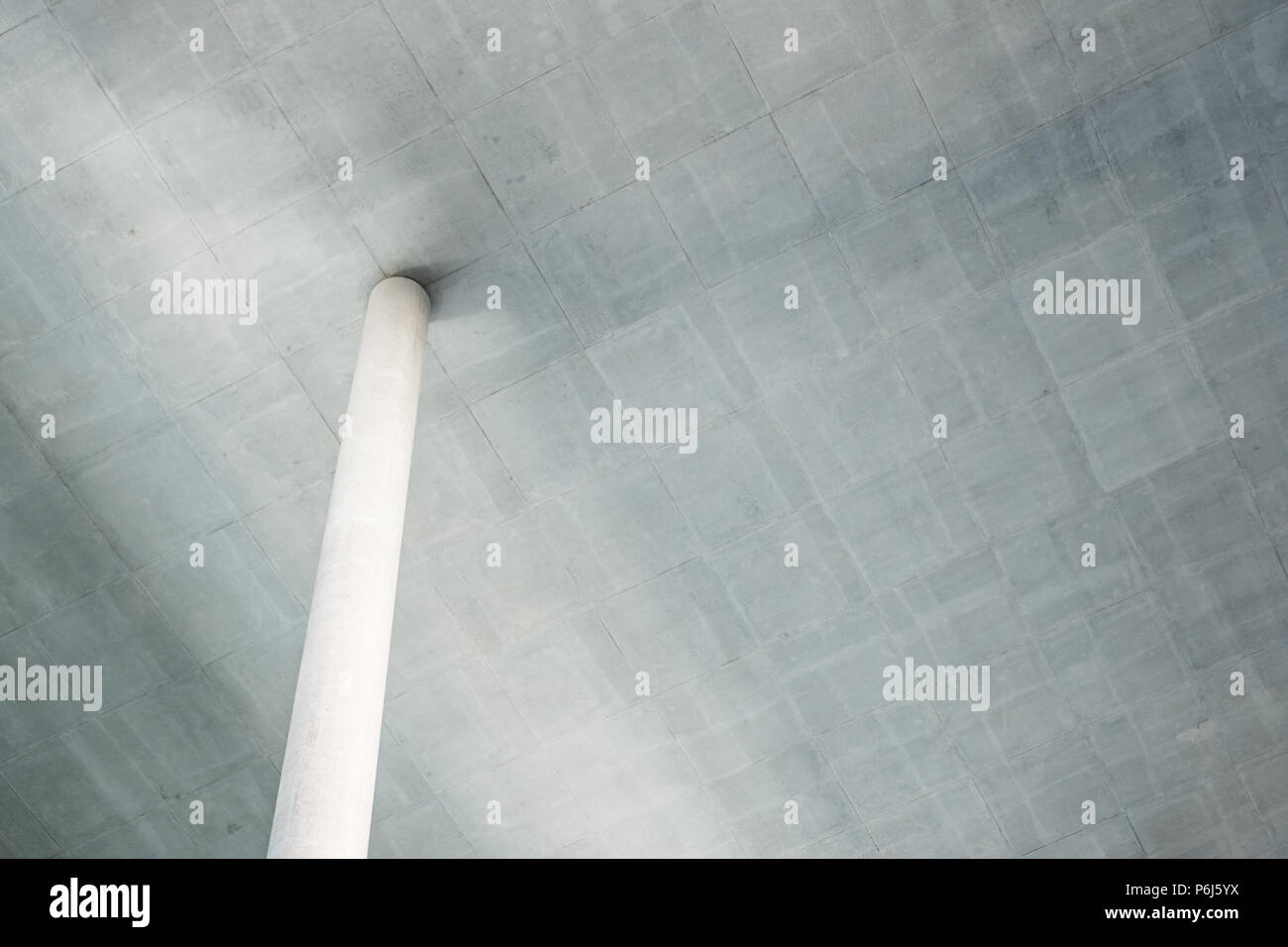 column under ceiling - concrete construction concept background Stock Photo