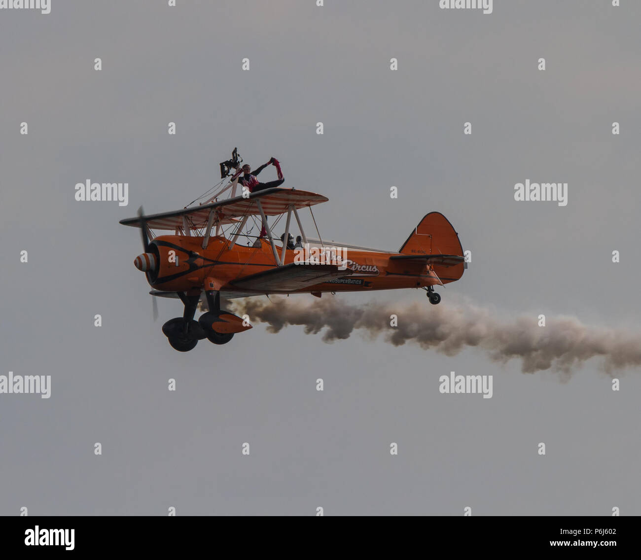 Wing Walker on a By-plane at an air show Stock Photo