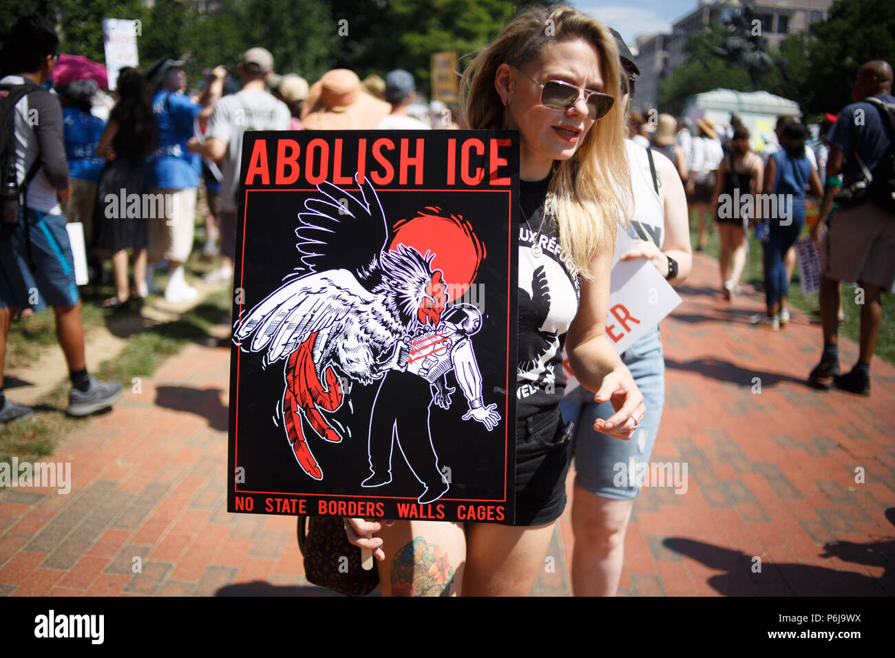 June 30, 2018 - Washington, District of Columbia, USA - Protestors gather in Lafayette Park, across from the White House, for the Families Belong Together rally. (Credit Image: © Michael Candelori via ZUMA Wire) Stock Photo