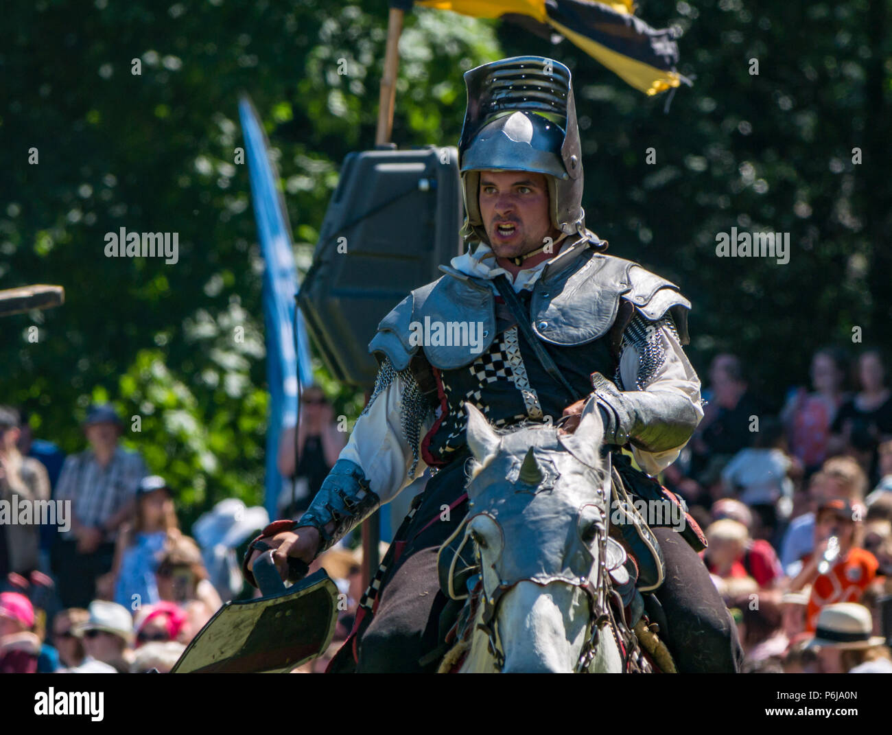 Jousting and Medieval Fair at Linlithgow Palace, Linlithgow, Scotland, United Kingdom, 30th June 2018. Historic Environment Scotland kick off their summer entertainment programme with a fabulous display of Medieval jousting in the grounds of the historic castle. The jousting is performed by Les Amis D'Onno equine stunt team with a knight in armour on a horse Stock Photo