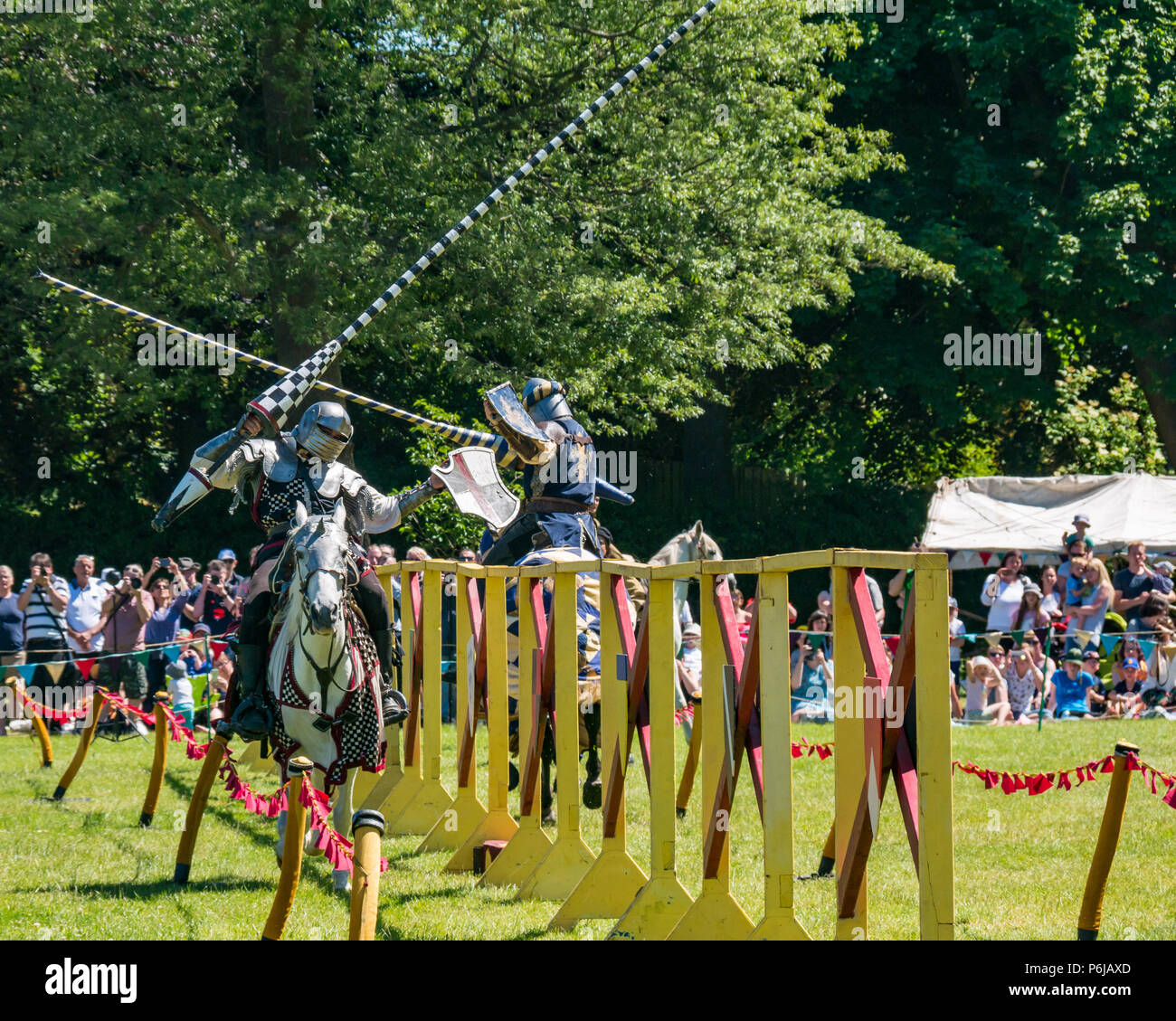 Jousting and Medieval Fair at Linlithgow Palace, Linlithgow, Scotland, United Kingdom, 30th June 2018. Historic Environment Scotland kick off their summer entertainment programme with a fabulous display of Medieval jousting in the grounds of the historic castle The jousting is performed by Les Amis D'Onno equine stunt team. Knights joust with lances Stock Photo