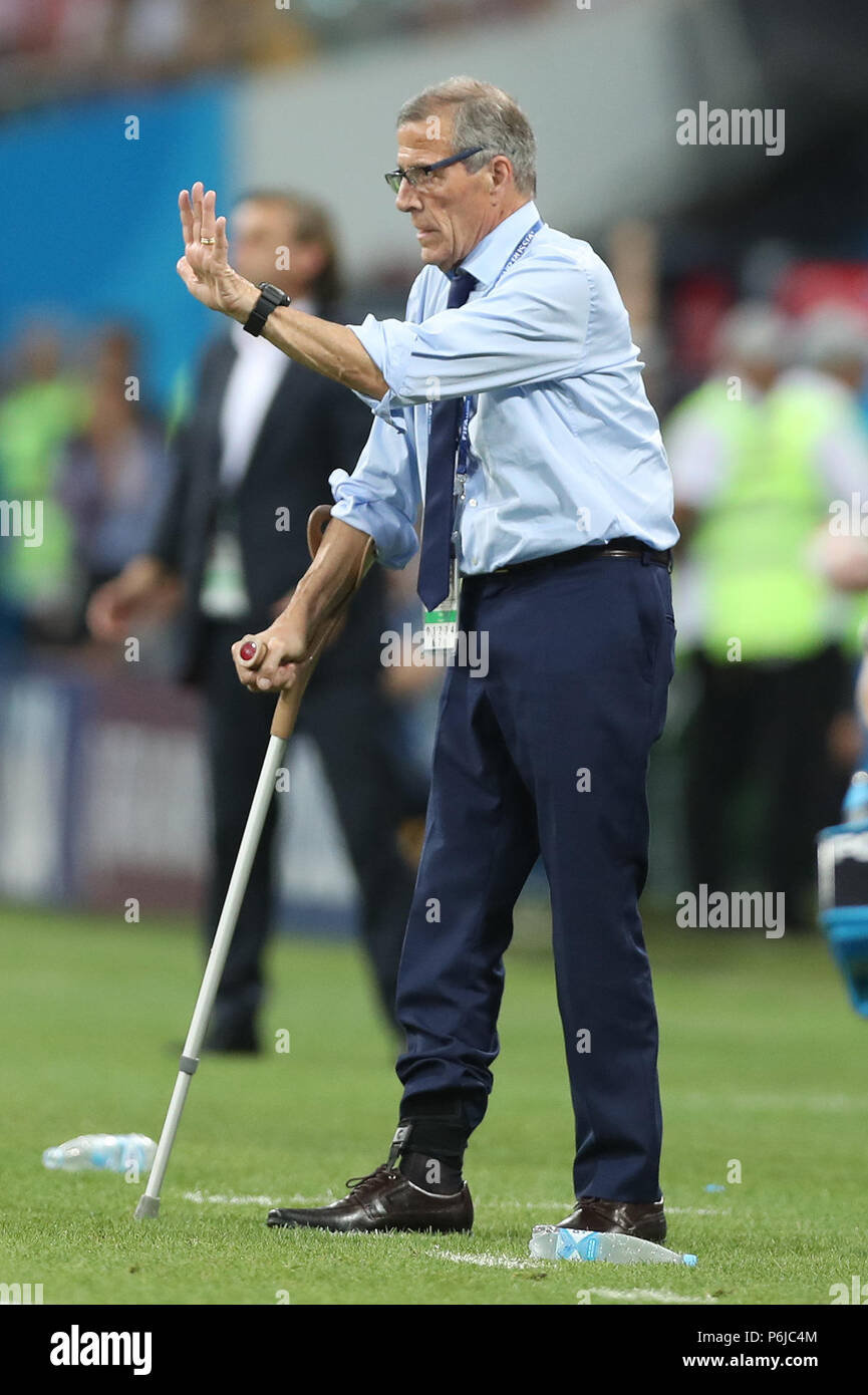 Sochi, Russia. 30th June, 2018. Head coach Oscar Tabarez of Uruguay reacts during the 2018 FIFA World Cup round of 16 match between Uruguay and Portugal in Sochi, Russia, June 30, 2018. Uruguay won 2-1 and advanced to the quarter-final. Credit: Fei Maohua/Xinhua/Alamy Live News Stock Photo