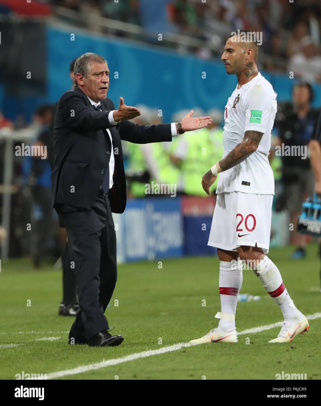 Sochi, Russia. 30th June, 2018. Head coach Fernando Santos (L) of Portugal reacts during the 2018 FIFA World Cup round of 16 match between Uruguay and Portugal in Sochi, Russia, June 30, 2018. Uruguay won 2-1 and advanced to the quarter-final. Credit: Ye Pingfan/Xinhua/Alamy Live News Stock Photo