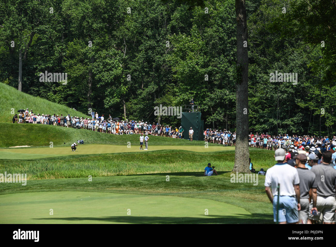 JUNE 30, 2018 - Huge galleries surround Tiger Woods (USA) on the eleventh hole during the third round at the 2018 Quicken Loans National at the Tournament Players Club in Potomac MD. Stock Photo