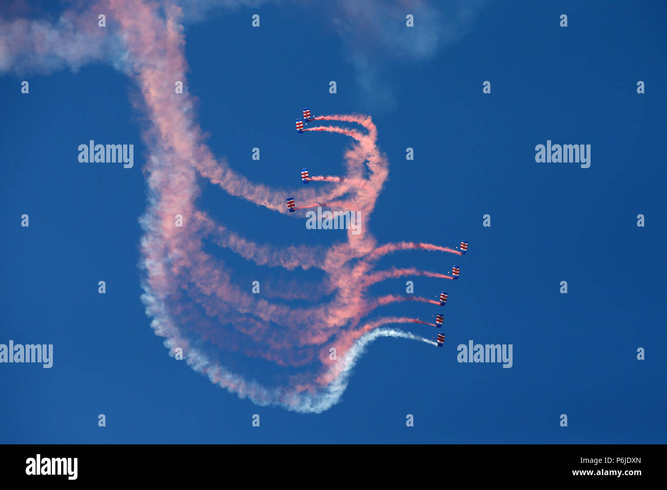Swansea, UK. 30th Jun, 2018. UK Weather. the Red Devils parachute display team perform at  The Wales Airshow 2018 in Swansea Bay, South Wales on Saturday 30th June 2018.  pic by Andrew Orchard/Alamy Live News Stock Photo