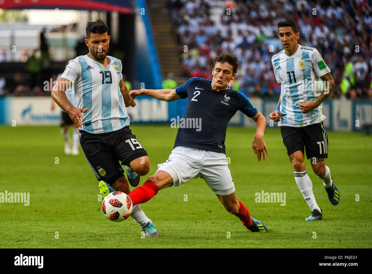 Kazan Arena, Kazan, Russia. 30th June, 2018. FIFA World Cup Football, Round of 16, France versus Argentina; Benjamin Pavard of France touching the ball in front of Sergio Aguero of Argentina Credit: Action Plus Sports/Alamy Live News Stock Photo