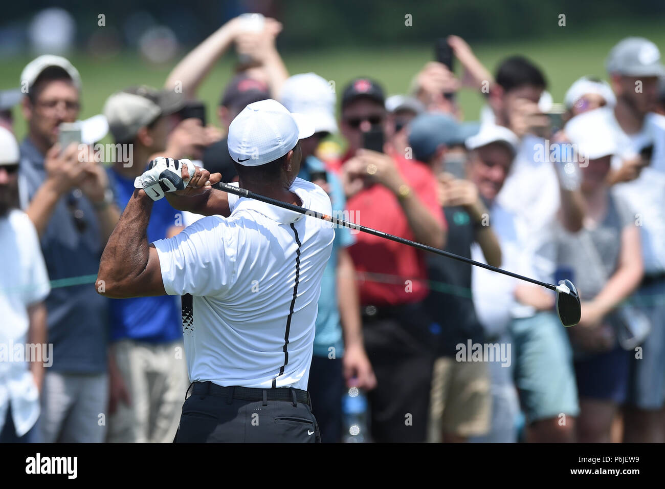 JUNE 30, 2018 - Tiger Woods (USA) tees off at the long par five second hole during the third round at the 2018 Quicken Loans National at the Tournament Players Club in Potomac MD. Stock Photo