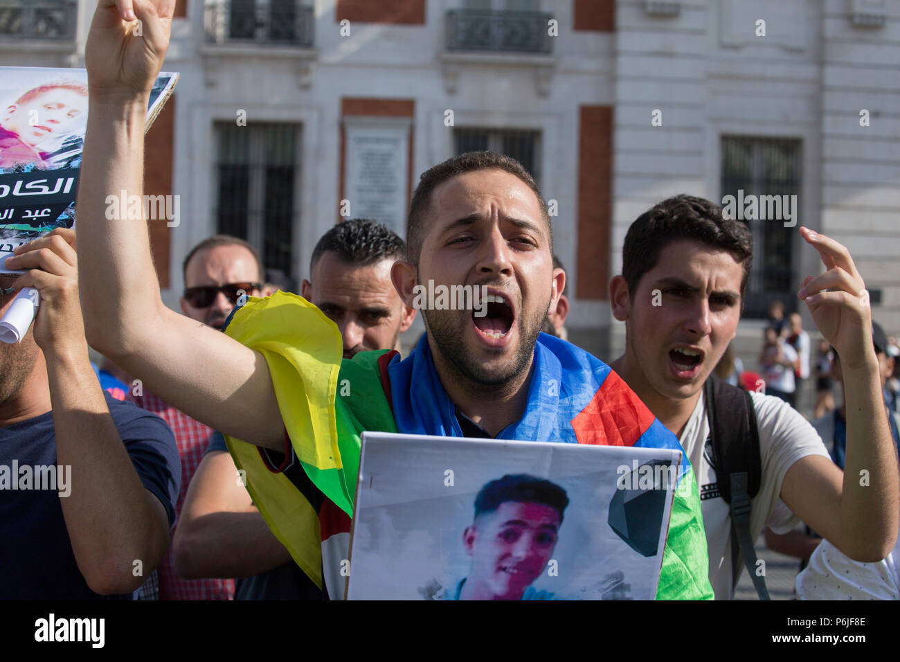 An activist is seen shouting during the protest. Protest against a sentence of 20 years imprisonment to the rifan leaders in Morocco. The Rifans fought against Spanish and French colonialism, and when independence came, the Alawi monarchy excluded the Rifans from administration, health, education and work. That is why in 2016 the Popular Movement, rifan started protests in the Rif area. Stock Photo