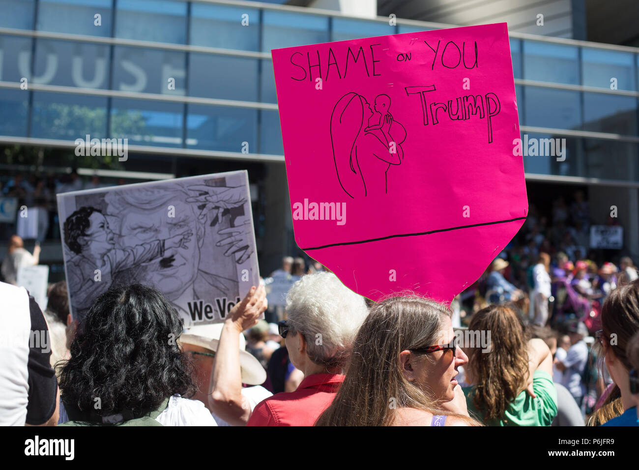 Eugene, Oregon, USA. 30th June, 2018. Citizens rally to protest the separation of immigrant children from their parents when crossing the border into the United States. Copyright: Gina Kelly/Alamy Live News Stock Photo