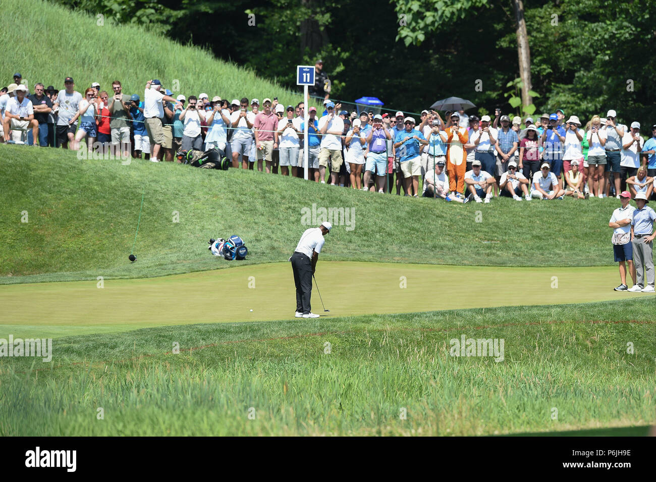 JUNE 30, 2018 - Tiger Woods (USA) putts on the eleventh green during the third round at the 2018 Quicken Loans National at the Tournament Players Club in Potomac MD. Stock Photo