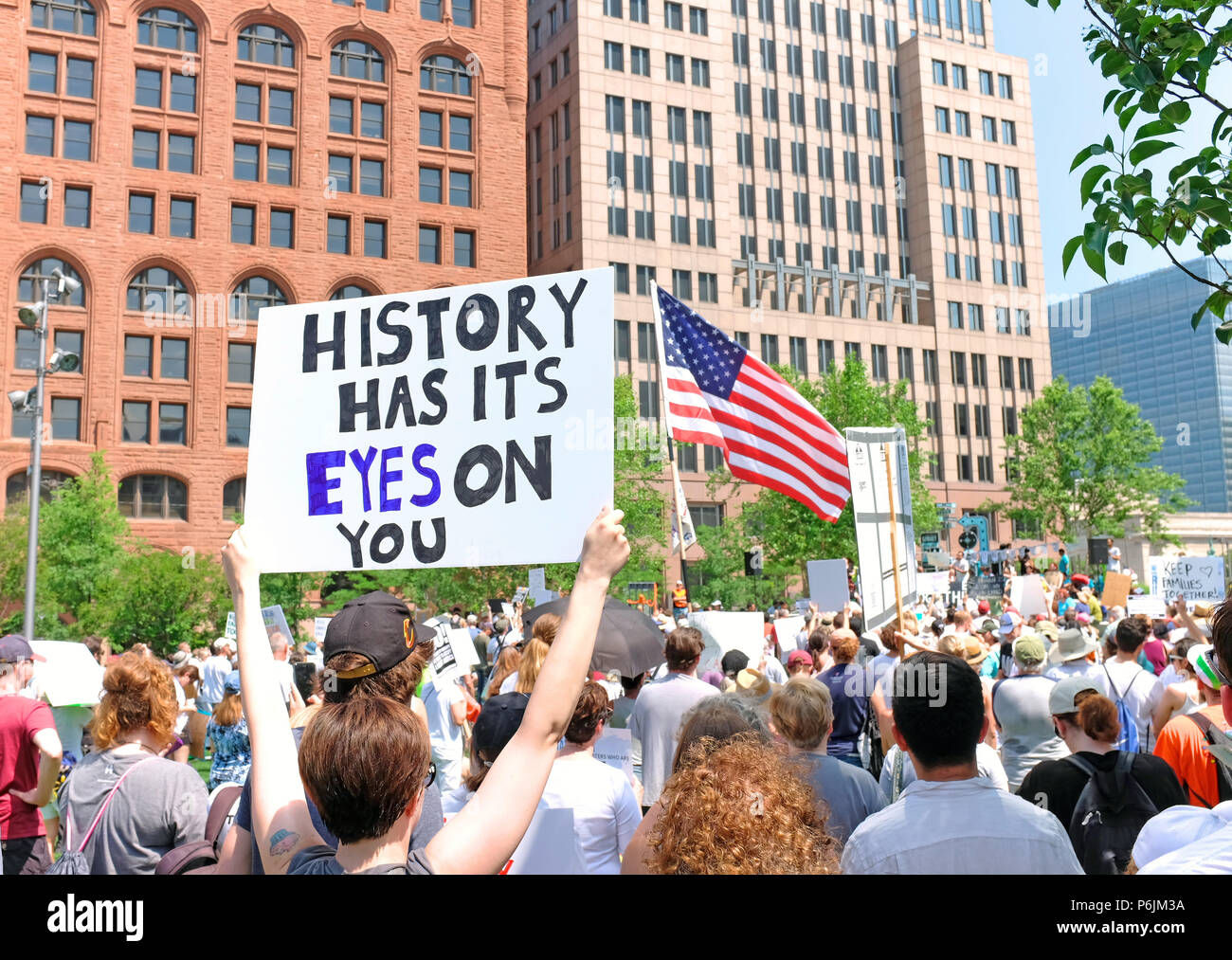 Cleveland, United States. 30th June, 2018.Protestors take to Public Square in downtown Cleveland, Ohio in opposition to the Trump administration policies separating children from parents at the borders. Credit: Mark Kanning/Alamy Live News Stock Photo
