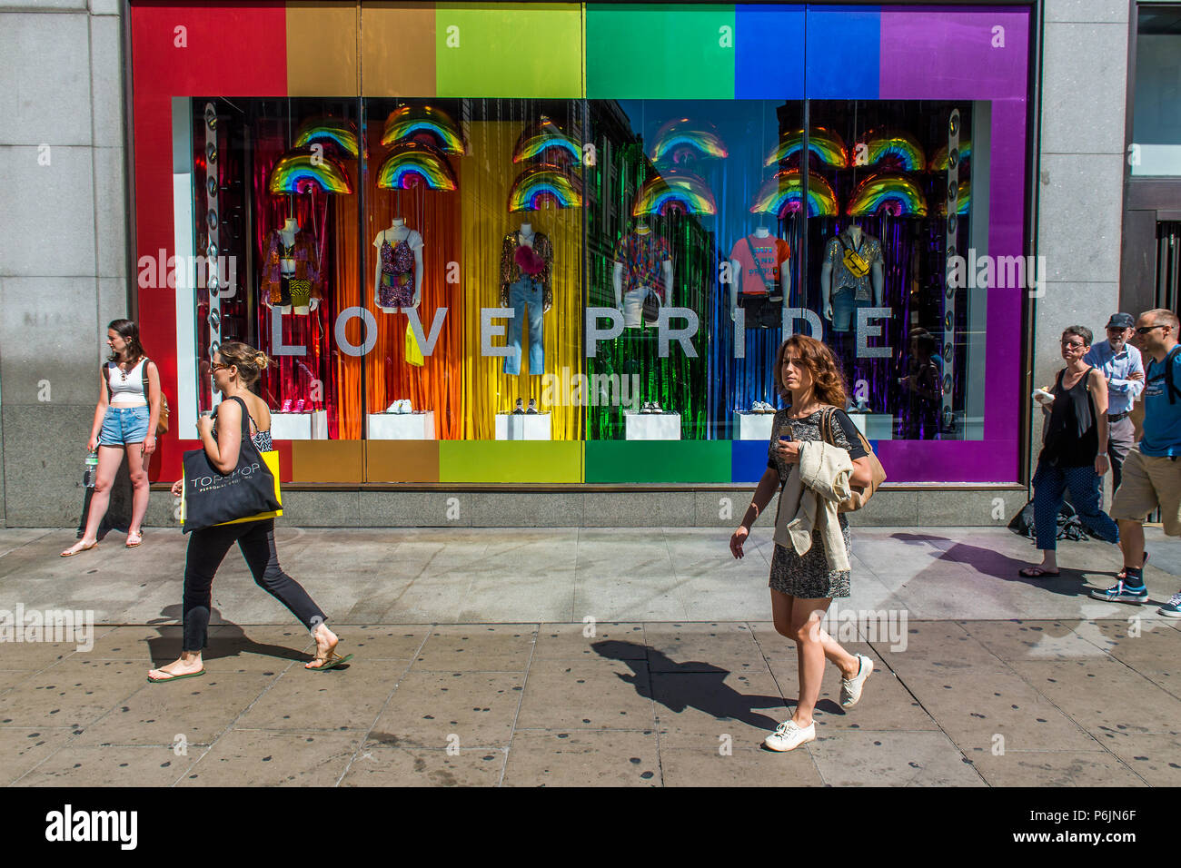 Shop window display supporting Pride, Oxford Street, London