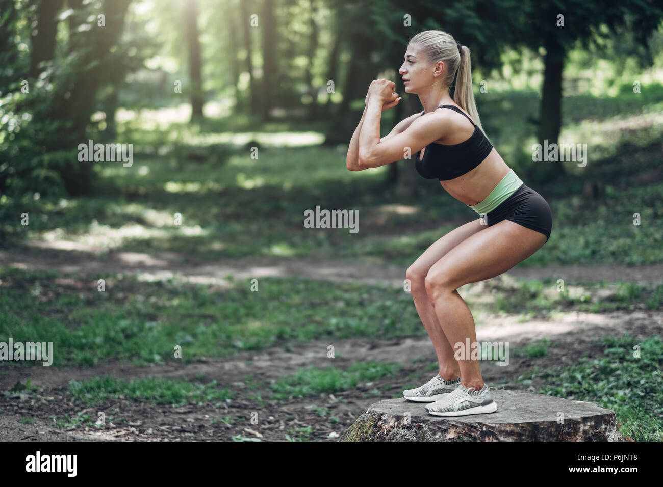 Fitness Woman Doing Training Workout Outdoor in Summer Morning Park. Concept Sport Healthy Lifestyle. Stock Photo